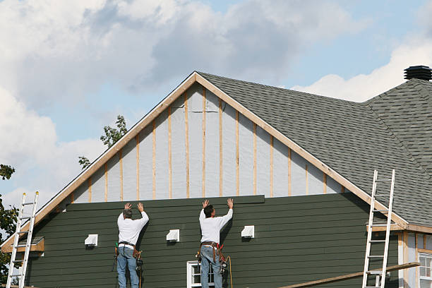 Professional Siding Replacement technician working in Boston, MA